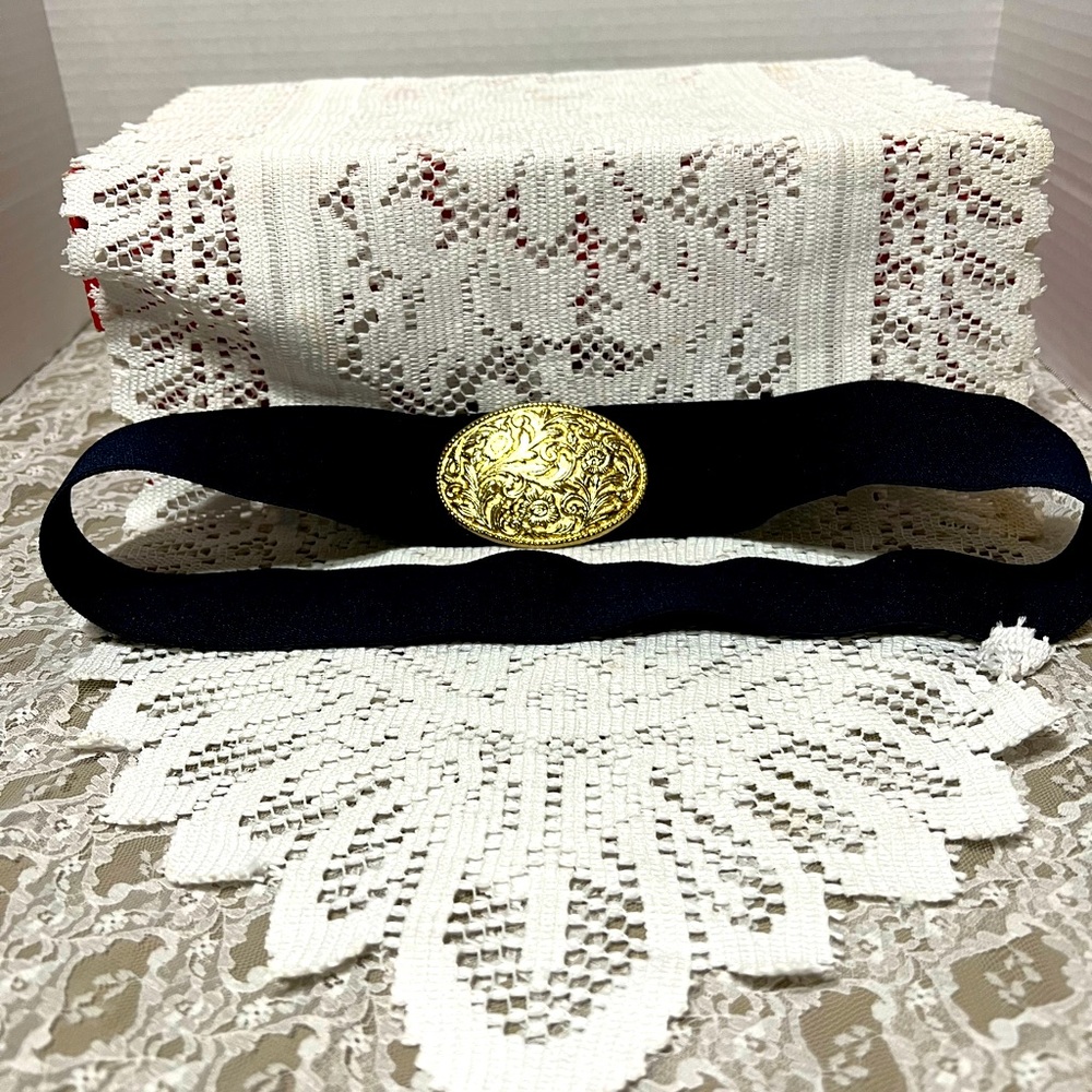 Blue stretchy belt with gold buckle